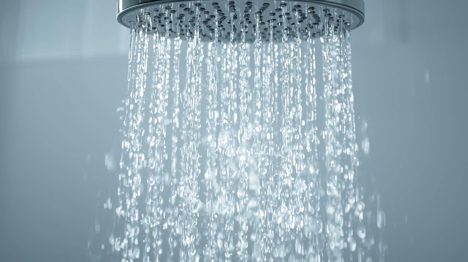 A stream of water coming out of a shower head.